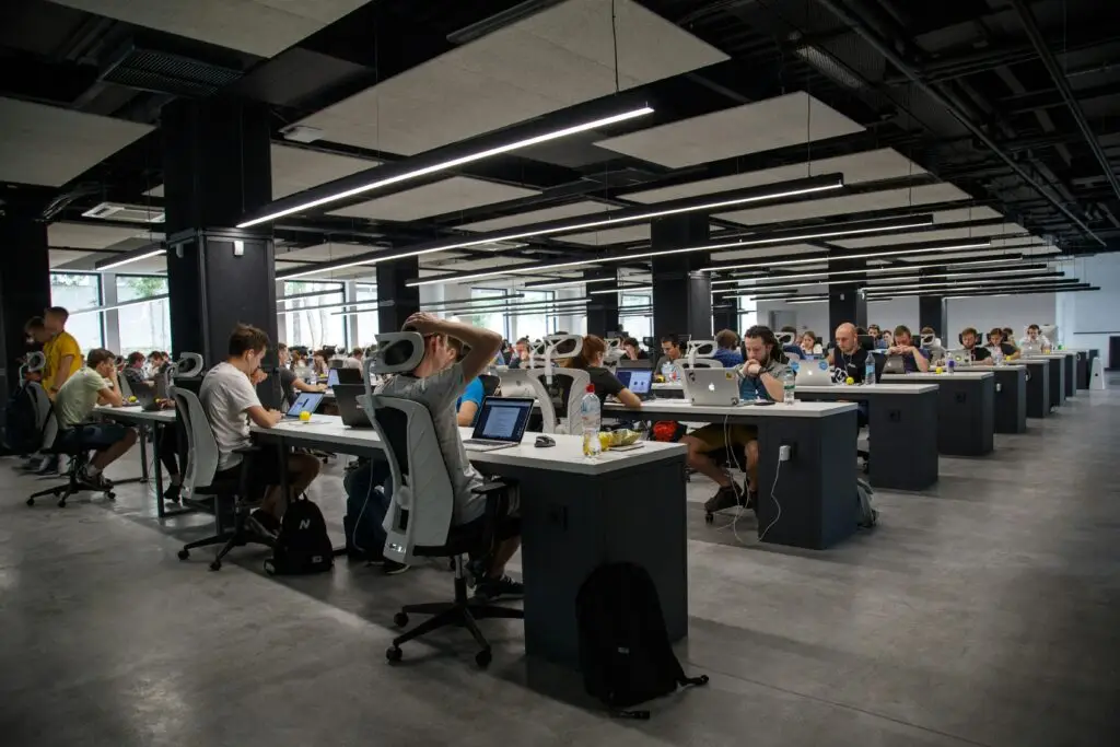 Tax professionals working together across a large open office
